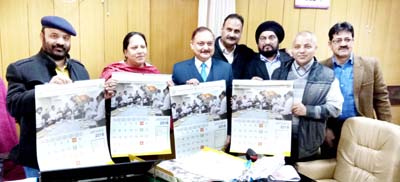 Minister for Health, Bali Bhagat and others releasing a calendar of Health Department on Friday.