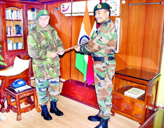 Lt Gen J S Sandhu giving charge to Lt Gen A K Bhatt of 15 Corps at Badami Bagh Cantonment in Srinagar on Thursday. (UNI)