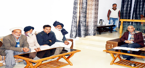 Dineshwar Sharma meeting a delegation in Poonch on Tuesday.