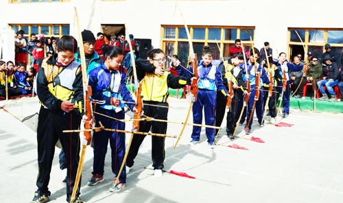 Girls being trained in archery during a personality development programme, which concluded on Sunday at LBA Riglam Hostel Saboo Thang in Leh. -Excelsior/ Morup Stanzin