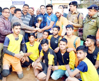 Winners of Kabaddi tournament posing for a group photograph along with MoS Sports, Sunil Kumar Sharma on Saturday.