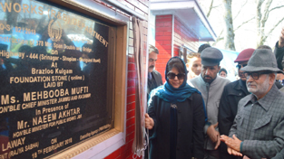 Chief Minister Mehbooba Mufti laying foundation stone of a bridge on Sunday.