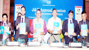 Minister for Industries CP Ganga and others releasing a news-letter on trade and industry during CII annual session in Jammu. -Excelsior/ Rakesh