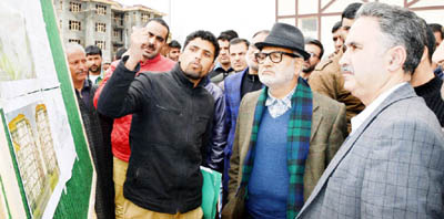Minister for Public Works Naeem Akhtar reviewing status of development work at Anantnag on Monday.