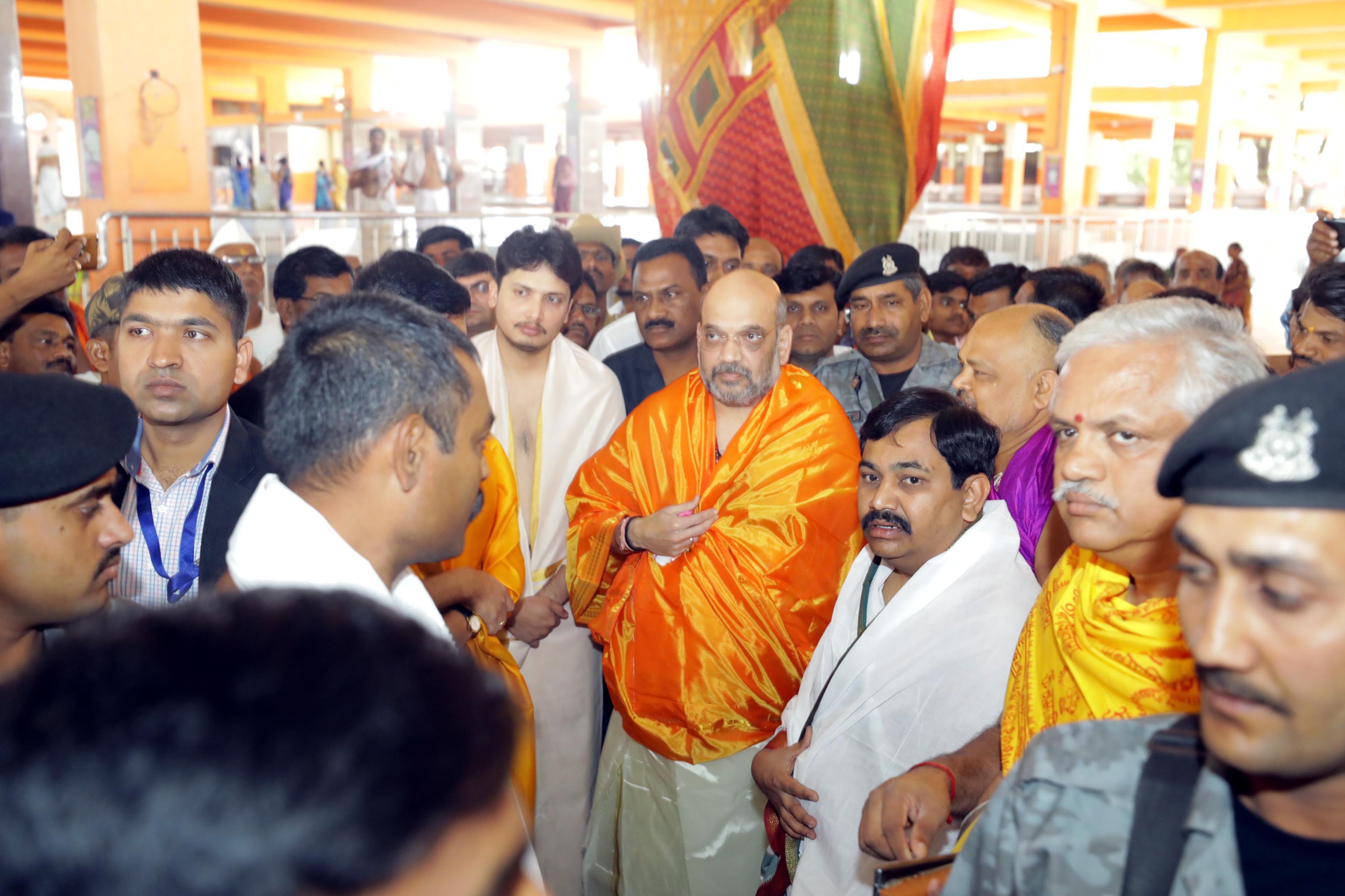 BJP National President Amit Shah offering prayers at Sri Kshethra Malakheda Temple in Kalaburagi, Karnataka on Monday. (UNI)