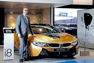 Vikram Pawah, president, BMW Group, with all new BMW i8 Roadster.