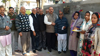 VC JAKFED Munish Sharma during inauguration of a water tank in Resham Ghar Colony on Tuesday.