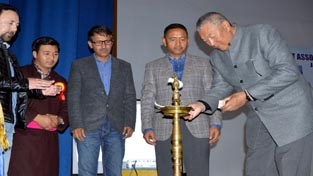 Minister for Cooperatives, Chering Dorjay lighting a lamp at Annual Day celebration of SAOLJ at Jammu.