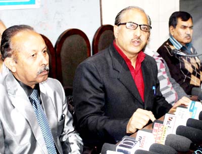 Members of JKRCEA addressing press conference at Jammu on Monday. -Excelsior/Rakesh