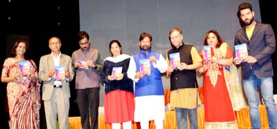 Minister for Forest, Lal Singh releasing book at Abhinav Theatre, Jammu on Monday.