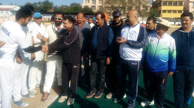 Chief guest and other dignitaries interacting with players during inaugural function of Salute & Tribute Cricket Tourney at Parade ground in Jammu.