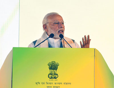Prime Minister, Narendra Modi addressing the gathering at Krishi Unnati Mela, in New Delhi on Saturday.