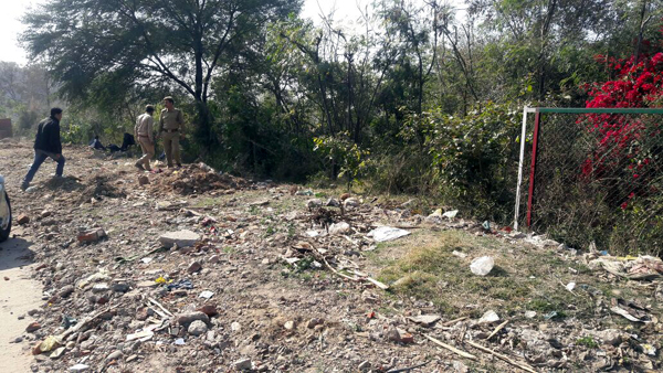 Land mafia breaks strong fencing of Forest Herbal Eco-Park near Mahamaya Temple on National Highway in Jammu. —Excelsior/Rakesh
