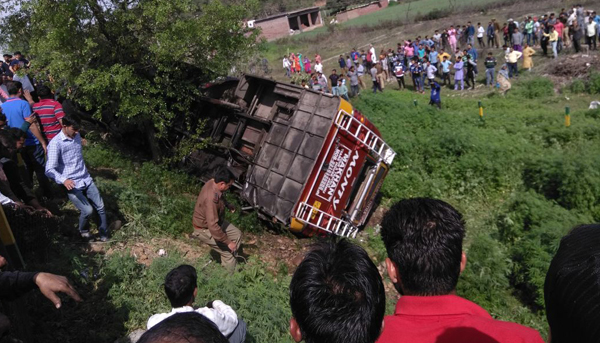 The badly damaged bus in a tragic road mishap at Mela Morh, Hiranagar on Sunday. Another pic on page 6. —Excelsior/Pardeep