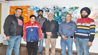 Ace Wushu player Kirti Sharma posing along with VC JU and other dignitaries in Jammu.