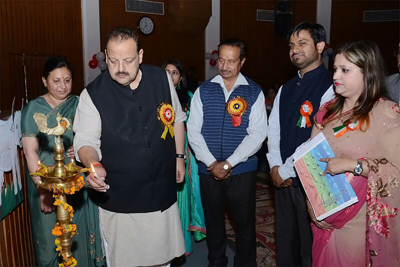 Provincial President National Conference Devender Singh Rana lighting ceremonial lamp during Annual Day celebration by Rain Drop Preschool in Jammu.
