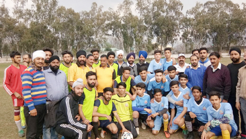 Young Footballers posing along with dignitaries in Poonch.