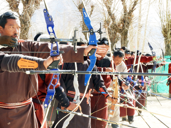 Archers in action during a tournament at Leh.