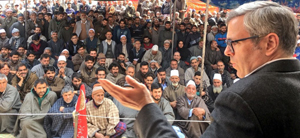 NC working president Omar Abdullah addressing workers' convention at Beerwah on Thursday.