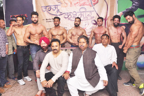 J&K Body Building team posing for a group photograph along with former Minister Raman Bhalla before being flagged off for Mr India Meet.