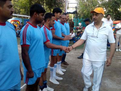 CRPF 121 Battalion Commandant, SS Rana interacting with players at the inaugural ceremony in Kathua.  