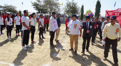Students performing activity in presence of dignitaries during 2nd Abhishek Sports Meet at YCET in Jammu.