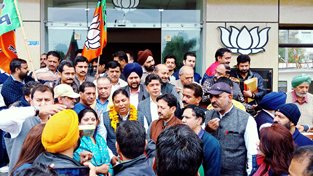 BJP leaders celebrating victory of party in two NE States at Jammu on Saturday.