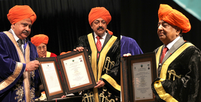 CUJ VC awarding Honoris Causa to Union Minister Dr Jitendra Singh and Ex Army Chief NC Vij while Dalai Lama looks on during the University Convocation on Sunday. — Excelsior/Rakesh