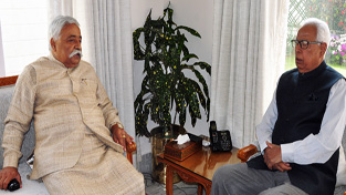 Governor NN Vohra and former Minister Ajay Sadhotra during a meeting at Raj Bhawan.