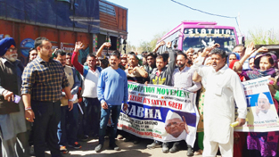People staging protest against Food Supplies Department at Udhampur.