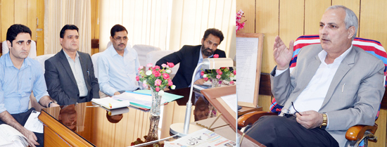 Minister for Revenue AR Veeri interacting with Evacuee Property Department officers at Jammu.
