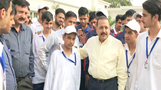 Union Minister Dr Jitendra Singh with a group of students from J&K at New Delhi on Tuesday.