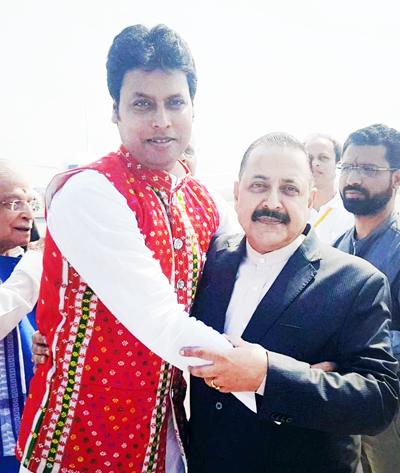 Newly sworn in Chief Minister of Tripura, Biplab Kumar Deb reaching out to Union Minister Dr Jitendra Singh for a jubilant hug, soon after the oath ceremony at Agartala on Friday.