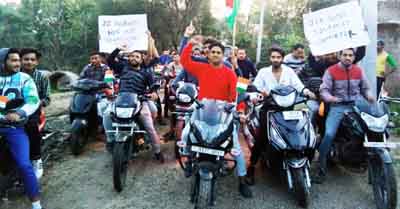 Members of Hindu Ekta Manch Samba and others during bike rally at Samba on Saturday. -Excelsior/Gautam