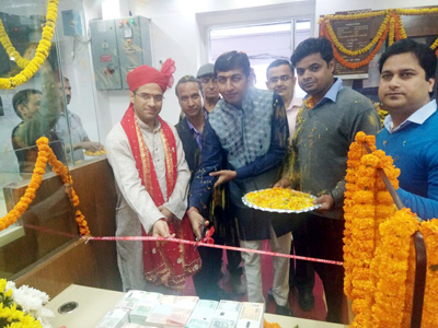 Anshul Garg, Additional CEO of Shri Mata Vaishno Devi Shrine Board, inaugurating fresh currency counter at J&K Bank's Vaishno Devi business unit.