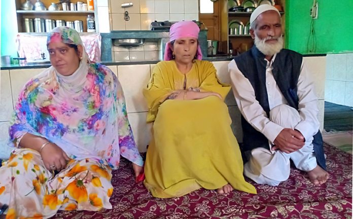 Family members of kidnapped cop, who was released on Friday, in their house at Arwani, Anantnag. -Excelsior/Sajad Dar