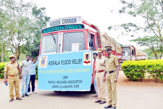 J&K Zone CRPF officers flagging off a consignment of relief material for Kerala flood victims.