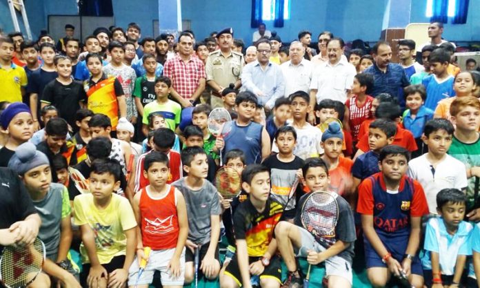 IGP Jammu Zone Dr SD Singh Jamwal, officials of Badminton Association and participating players posing for group photograph.