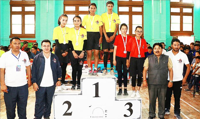 Medal winners posing along with officers and officials during Ladakh School Olympics in Leh.