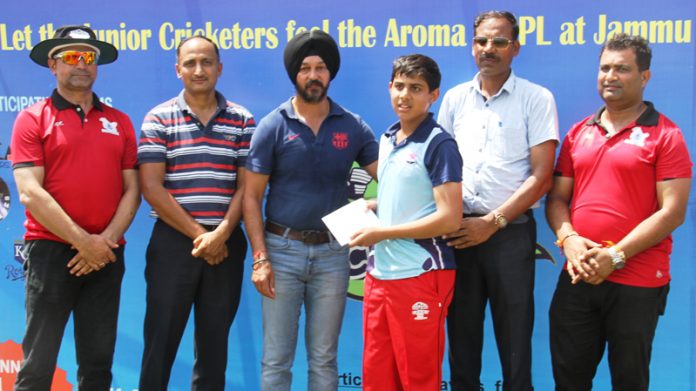 Right-arm leg spinner Agastya Sharma receiving man of the match award from former skipper J&K Ranji Trophy team, Kavaljeet Singh and other dignitaries at KC Sports Club in Jammu.