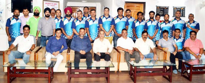 JU’s Employees Cricket Reasi posing alongwith Prof Manoj Dhar in Jammu.