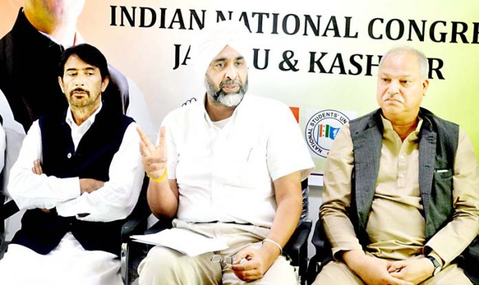 Manpreet Badal, Finance Minister of Punjab along with senior Congress leaders of J&K addressing a press conference at Congress headquarters in Srinagar on Wednesday. -Excelsior/Shakeel