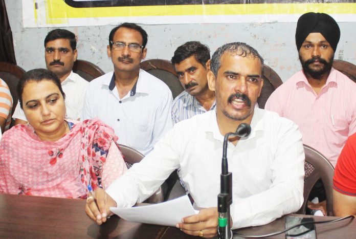 President of General Line Teachers Forum addressing a press conference at Jammu on Monday. -Excelsior/ Rakesh