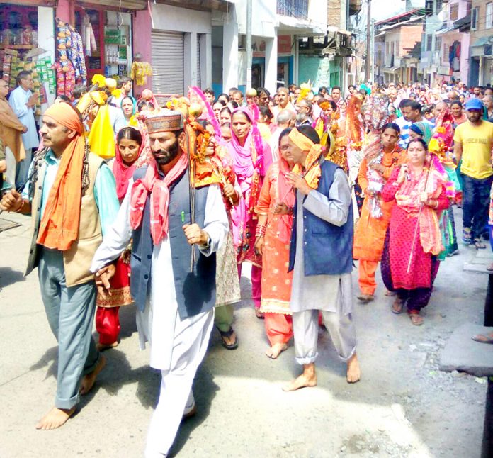 Pilgrims leaving for Mani Mahesh Shrine from Bhadarwah on Wednesday. — Excelsior/Tilak Raj