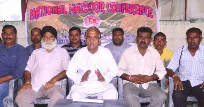 National Mazdoor Conference president, Subash Shastri addressing a meeting at Jammu on Tuesday.
