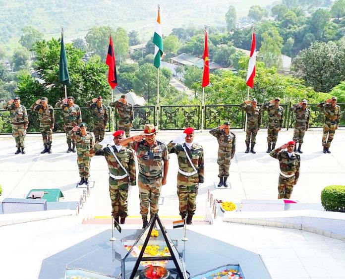 Army officers paying tributes to martyrs at War Memorial at Romeo Force Headquarters.