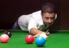 Cueist in action during Six Red Balls Tournament at Billiards Hall, MA Stadium in Jammu. — Excelsior Rakesh