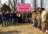 Army and FTII officers along with the youth posing for a group photograph on the culmination of Film Making Course at Baramulla on Sunday.