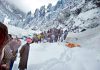 Dead bodies of avalanche victims being removed to Pahalgam by the villagers. -Excelsior/Sajad Dar