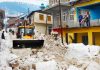 A machine clearing heaps of snow from the internal roads in Bhaderwah town on Thursday. —Excelsior/Tilak Raj